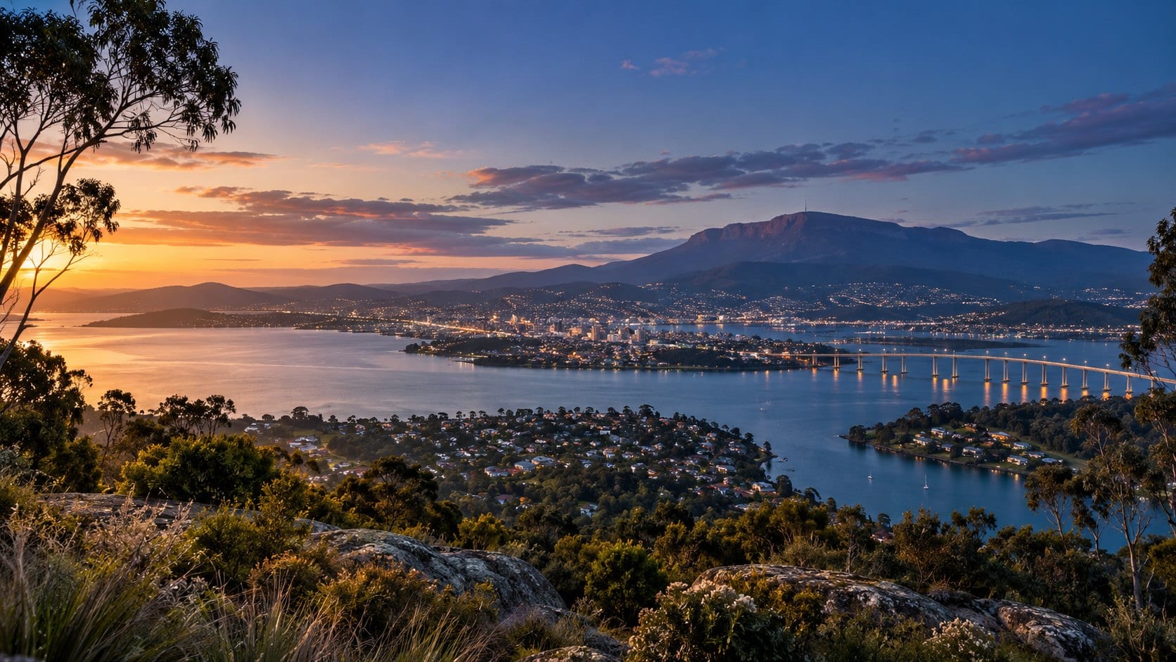 Sunset over the Derwent River, the Tasman Bridge and kunanyi / Mount Wellington